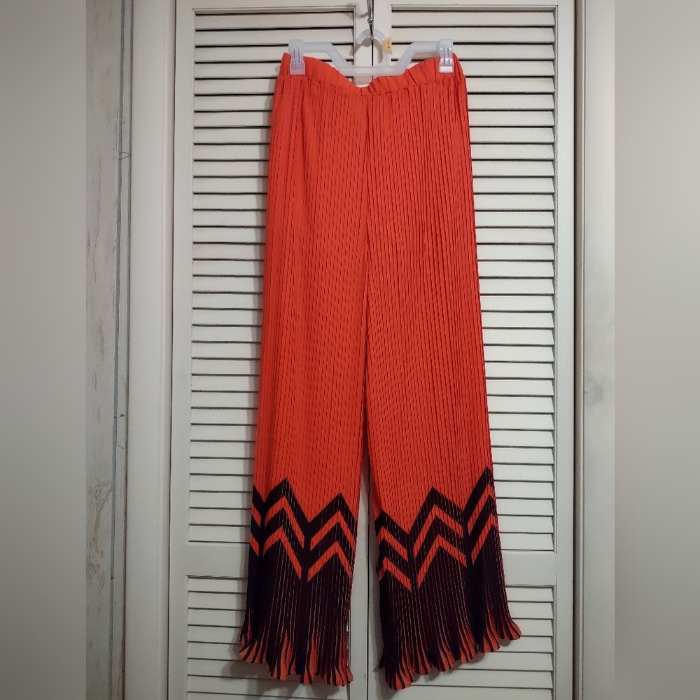 The Sang Pleated Flare Leg Pant